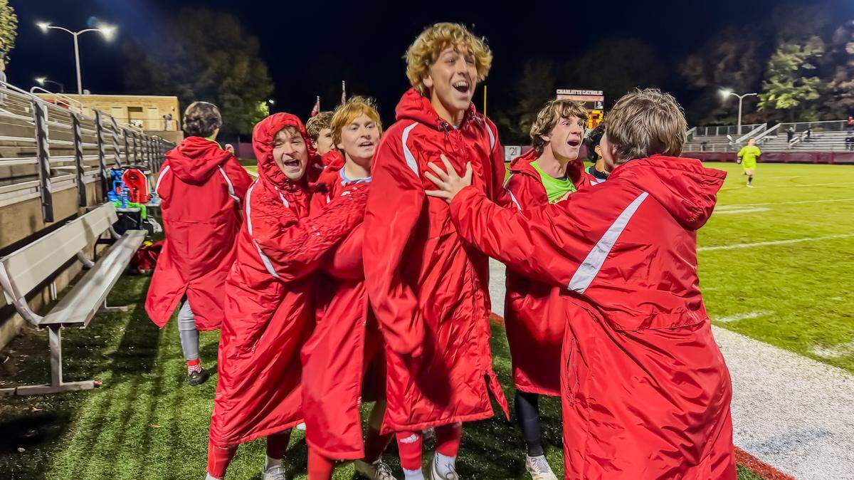 Charlotte Catholic celebrates their goal in overtime at the third round of the NCHSAA 4A playoffs at Charlotte Catholic on November 14th in Charlotte NC