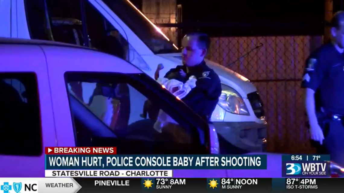 CMPD officers console baby after mother wounded in Charlotte ...
