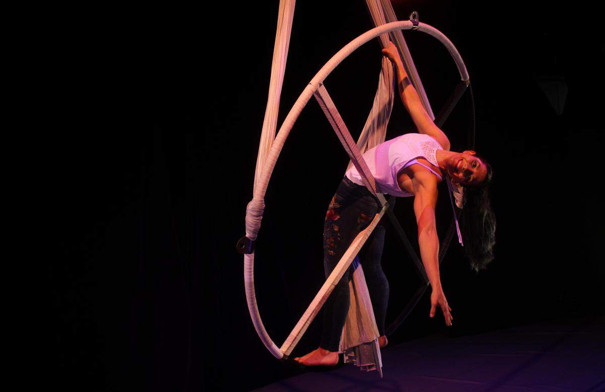 Carolina Quirós Otárola performs on the wheel at a Dance for All by Caroline Calouche & Co., in November 2020.