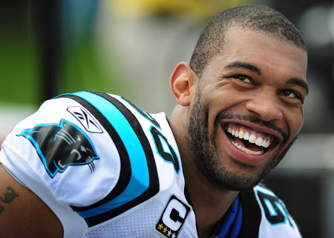 In 2008, Carolina Panthers defensive end Julius Peppers smiled during a 34-0 win for the Panthers over the Kansas City Chiefs.