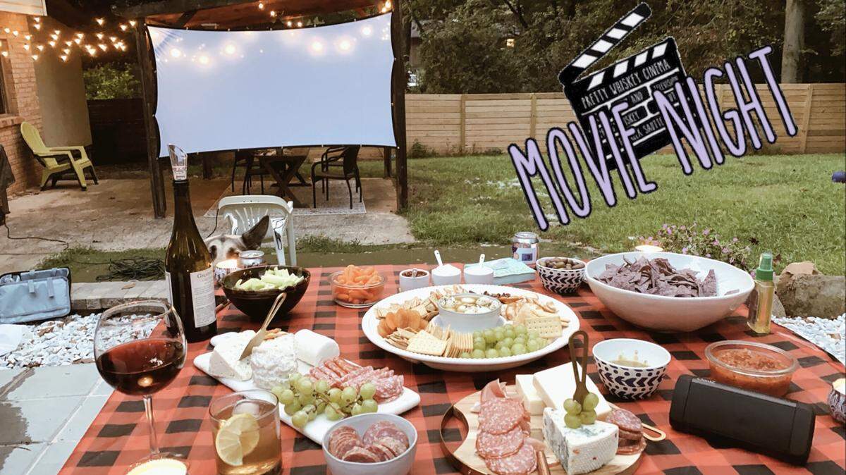 Katie Sara hosted a backyard quarantine movie night and posted about it in the Charlotte Facebook group, Fatten The Curve.