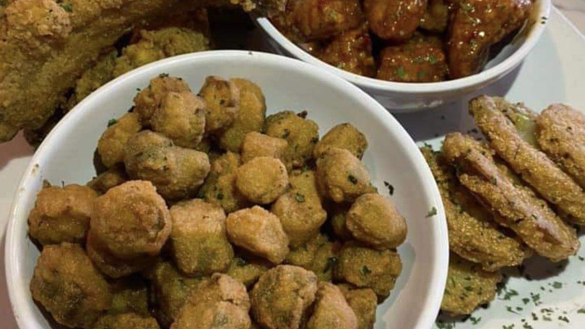 Smith’s Soul Food Sample includes fried green tomatoes, pork loin bites, fried okra and a fried pork chop.
