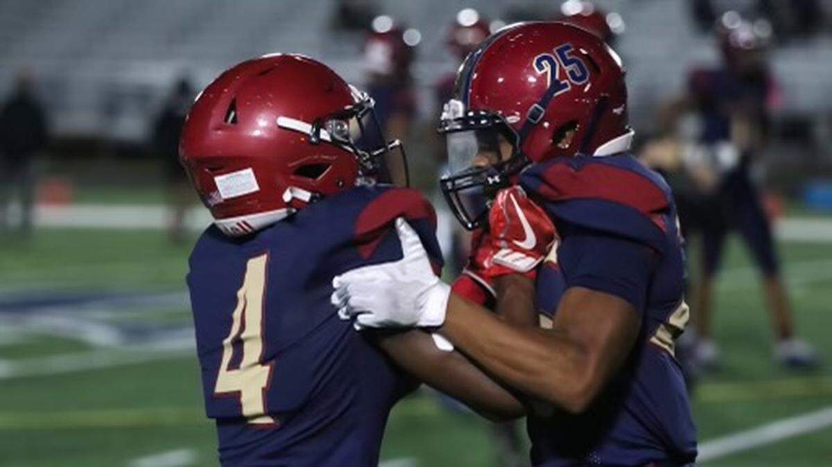 Mallard Creek Teammates celebrate as they score a second touchdown in thr first quarter
