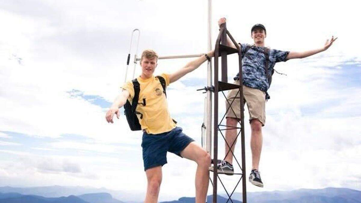 Charlotte videographer Carson Philbin, 24, right, and his longtime friend Elliott Schultz, left, on one of their routine runs. Philbin died cliffdiving in Ka’u, Hawaii, on Saturday, Jan. 13, 2024.