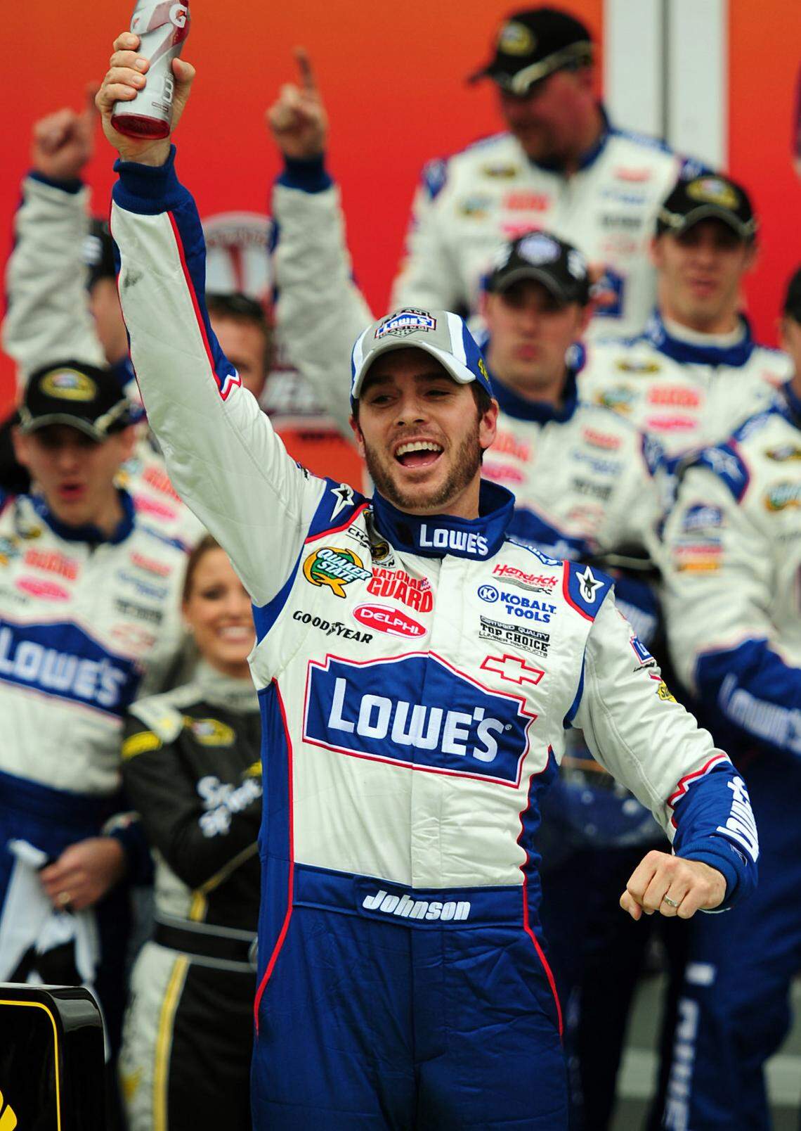2/11/10 NASCAR Sprint Cup Series driver (48) Jimmie Johnson celebrates in victory lane following his victory in the first Gatorade Duel race Thursday at Daytona International Speedway. Johnson beat Kevin Harvick to the line. JEFF SINER - jsiner@charlotteobserver.com