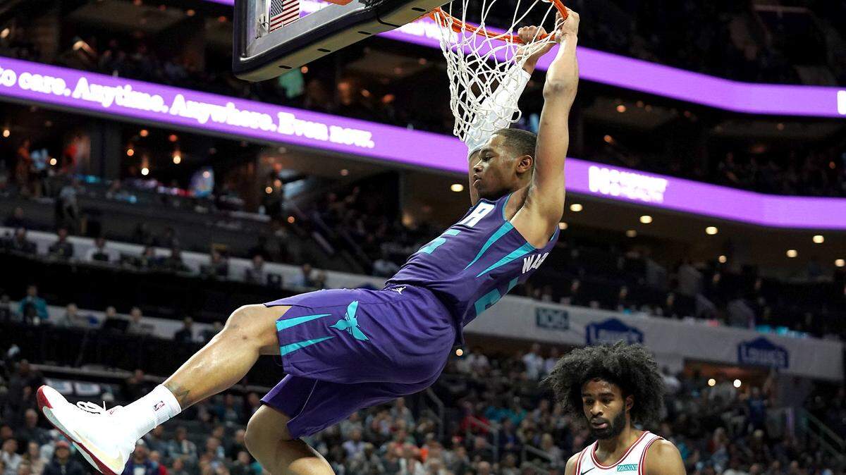 Charlotte Hornets forward P.J. Washington dunks against the Chicago Bulls on Wednesday.