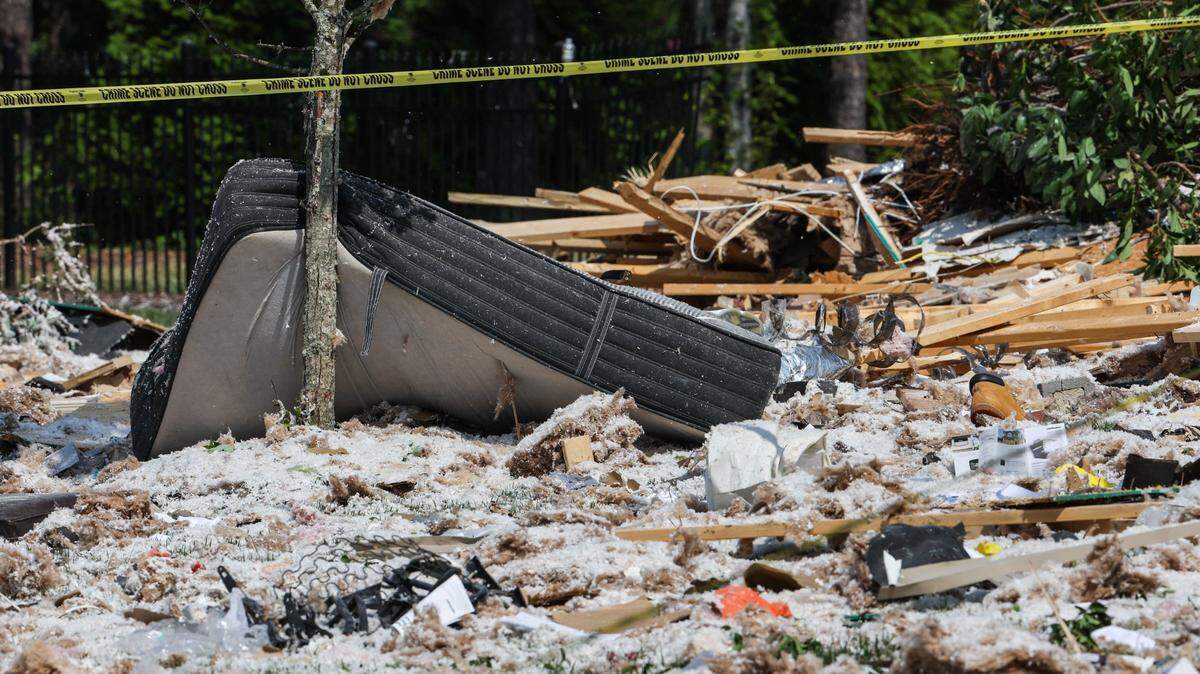 The remains of a house that sustained an explosion around 11:52pm Monday night are seen on the 280 block of Barber Loop Road on Tuesday, August 22, 2023. Mooresville firefighters found one person dead in the 25-foot pile of rubble.