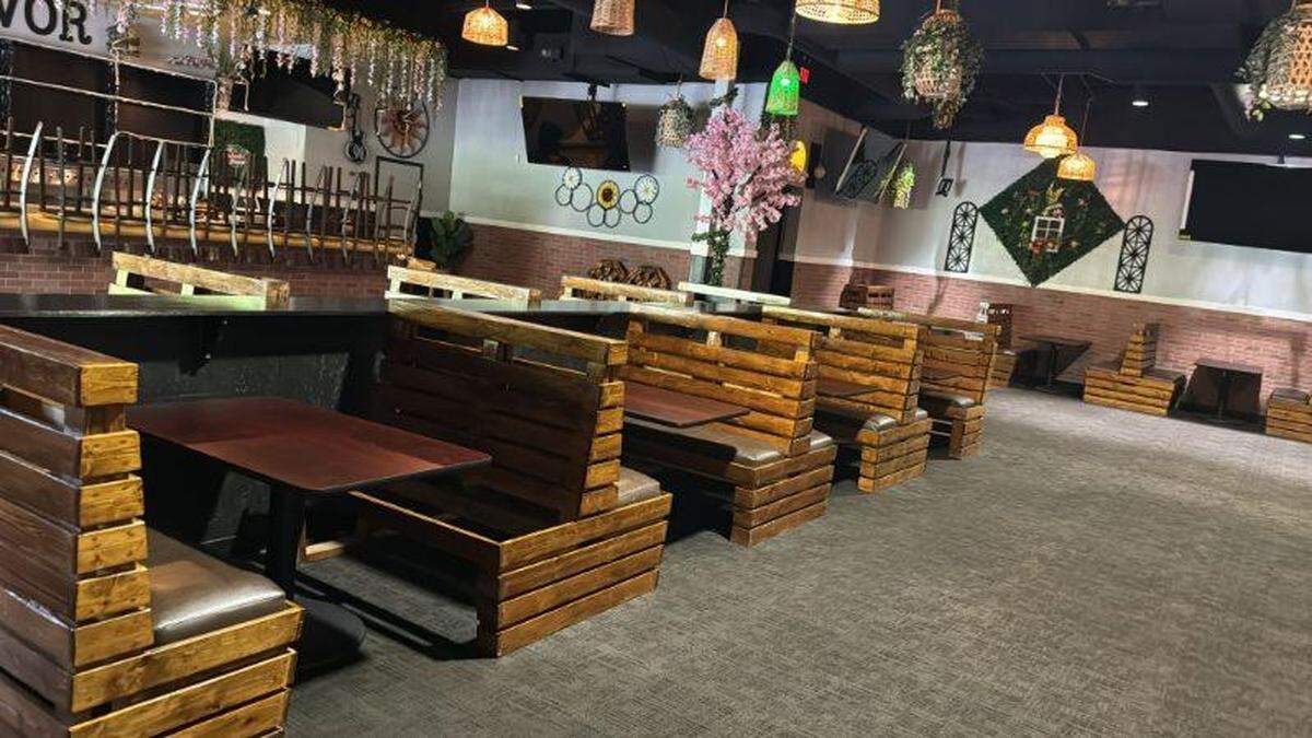 Savor Restaurant and Bar — opening Saturday, May 11 — has floral accents throughout the dining room.