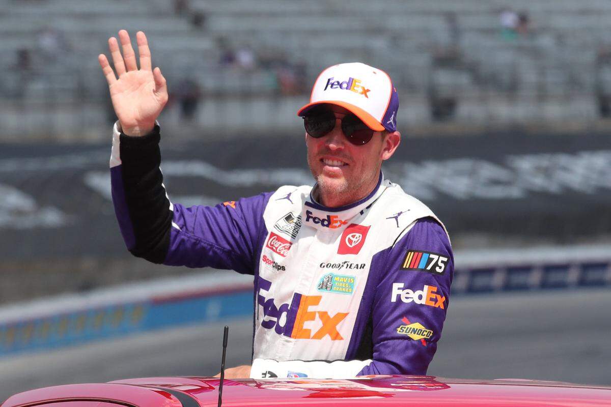 Sep 24, 2023; Fort Worth, Texas, USA; NASCAR Cup Series driver Denny Hamlin (11) during driver introductions before the AutoTrader EcoPark Automotive 400 at Texas Motor Speedway.