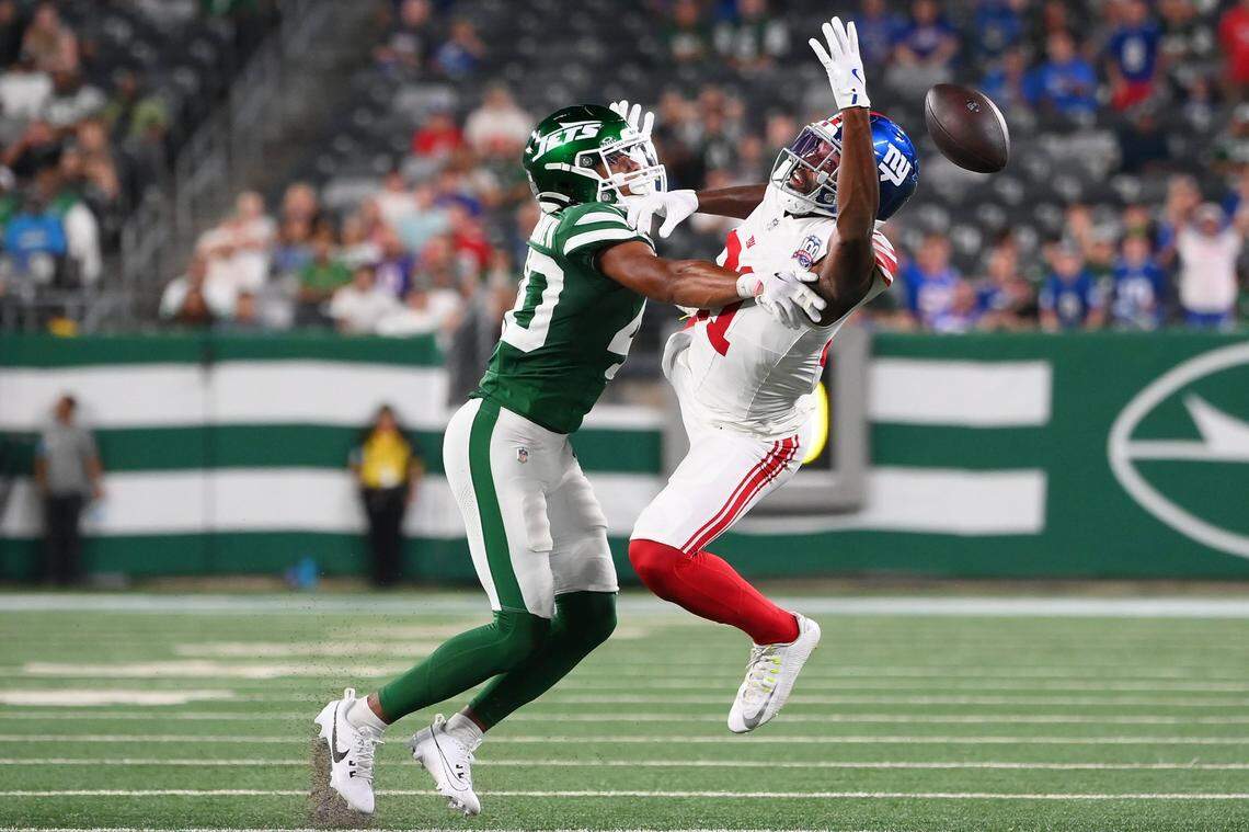 Aug 24, 2024; East Rutherford, New Jersey, USA; New York Jets cornerback Shemar Bartholomew (40) breaks up a pass intended for New York Giants wide receiver Miles Boykin (81) during the second half at MetLife Stadium. Mandatory Credit: Rich Barnes-USA TODAY Sports