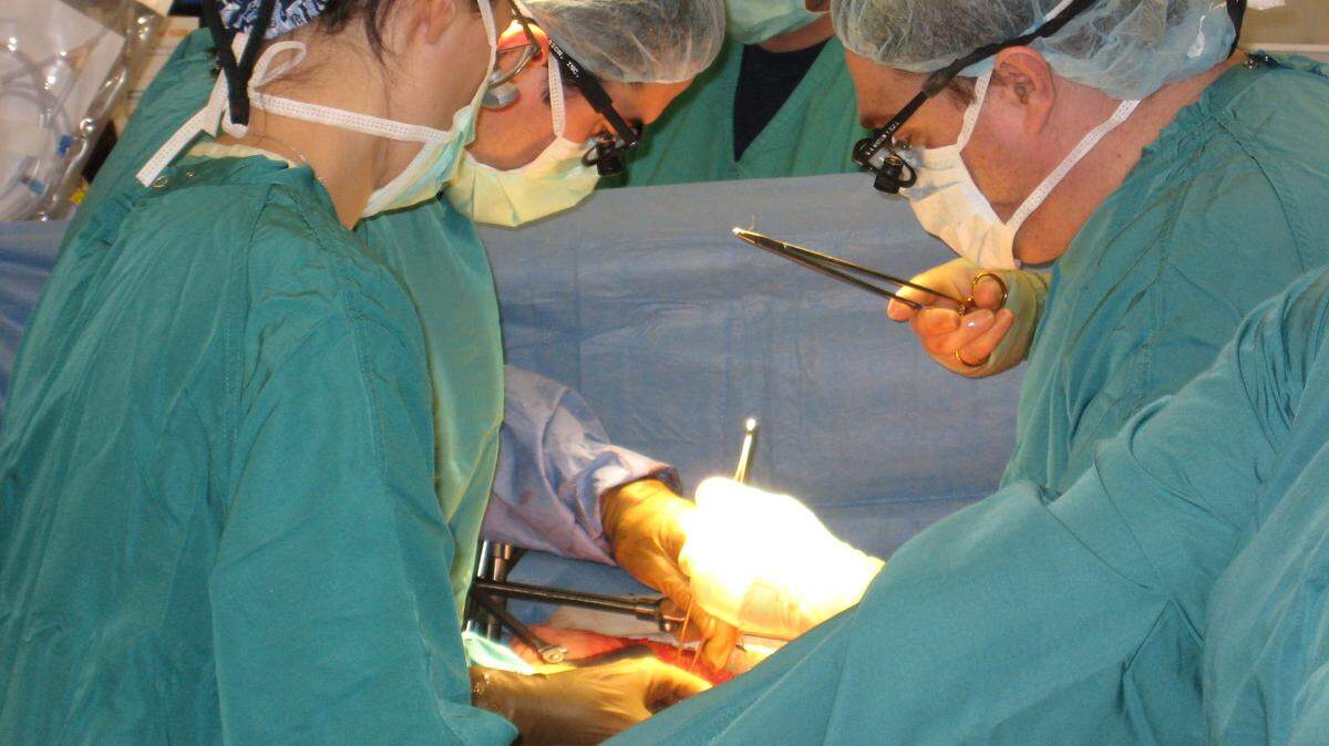 In this file photo UNC Health Care surgeons transplant a liver into a patient.