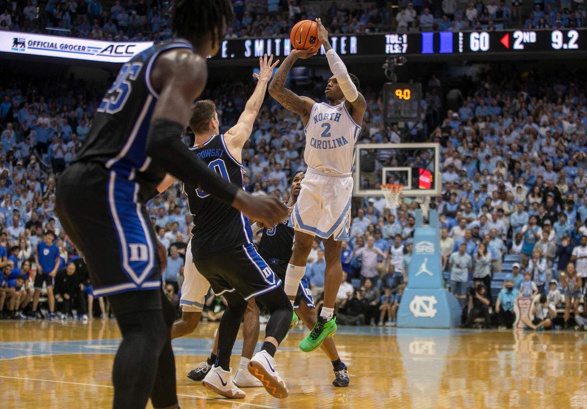 North Carolina’s Caleb Love (2) misses a three point attempt to tie the score with :09 seconds to play against Duke on Saturday, March 4, 2023 at the Smith Center in Chapel Hill, N.C.