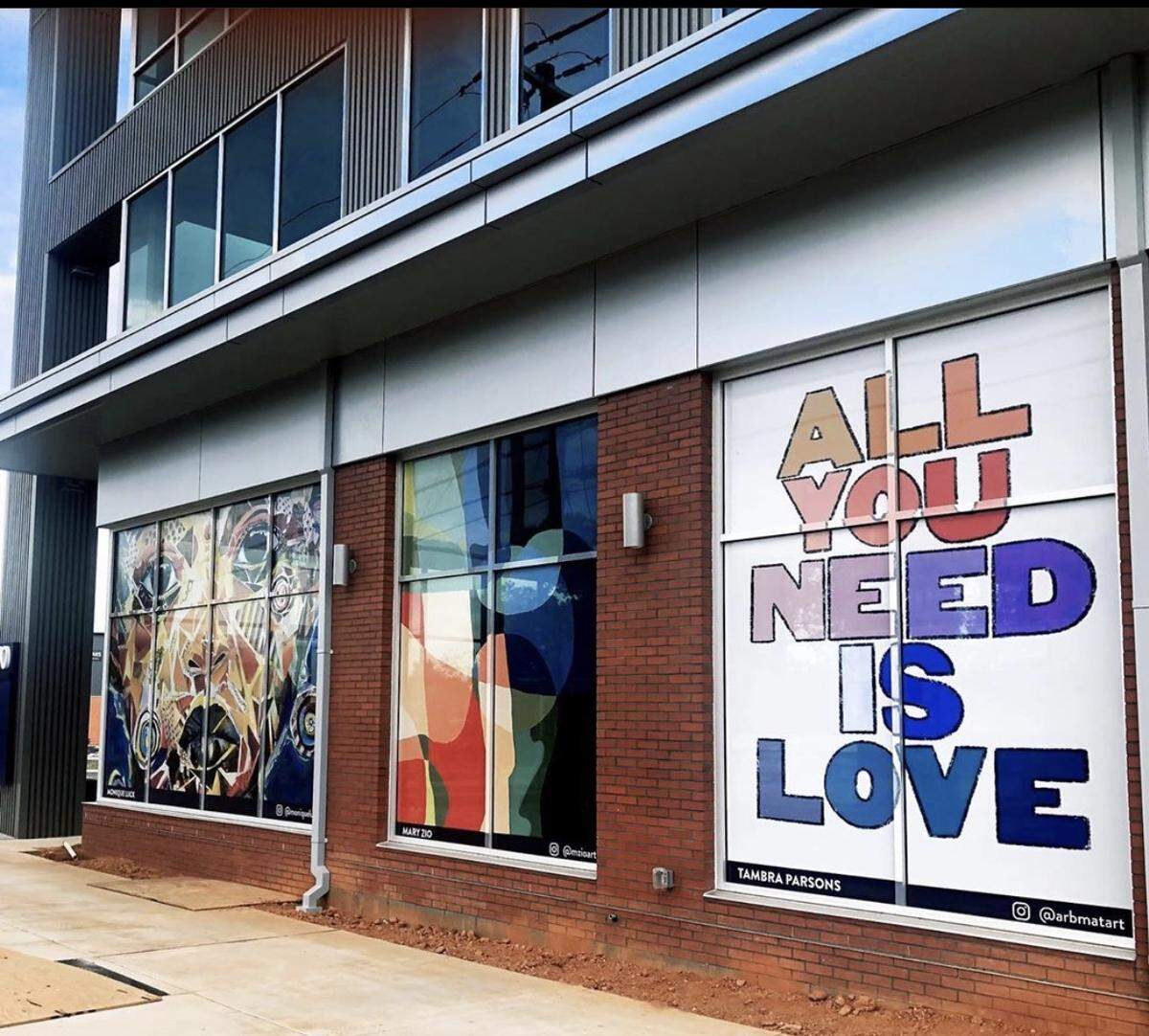 ArtPop artists teamed up with Charlotte Center City Partners, Lowe’s and South End CLT to create 13 Windows of Hope in Charlotte’s South End neighborhood. Shown from left are works from Monique Luck, Mary Zio and Tambra Parsons.