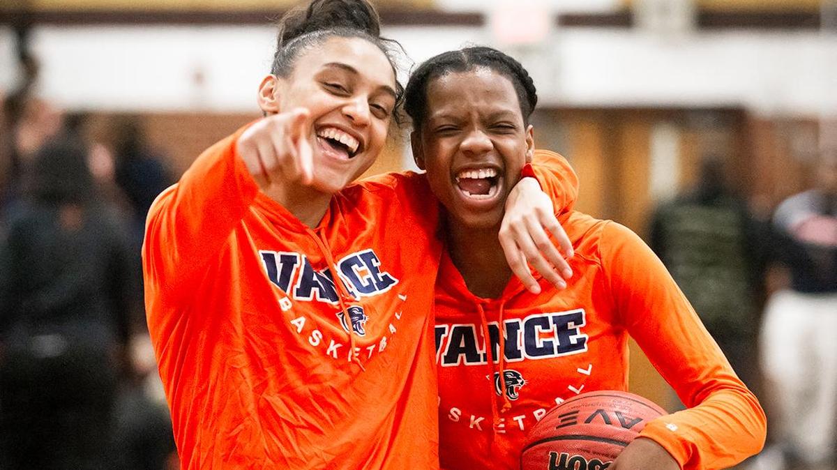 Two Vance High girls teammates ready for the start of Tuesday’s game against West Charlotte. Vance, No. 2 in the Sweet 16, got the win.