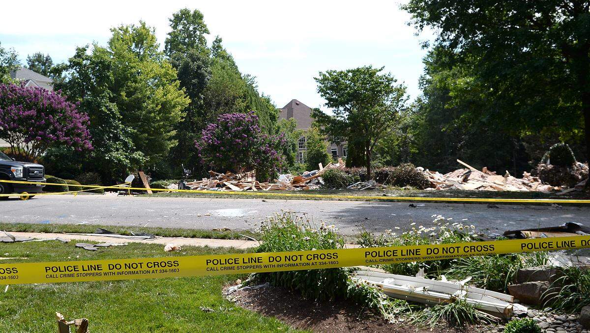 The street-level view of the home that exploded Tuesday afternoon on James Jack Lane is one of obliteration. Investigators from ATF, CFD and CMPD dug through the rubble of a home Ballantyne Wednesday, July 3, 2019. An explosion destroyed the south Charlotte house Tuesday afternoon, authorities said, and left one person dead and another with life-threatening injuries. The house in the 11000 block of James Jack Lane was last sold for $1.27 million in 2 015, county records show.