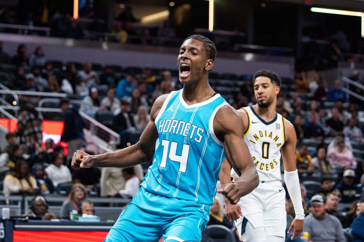 Charlotte Hornets forward Moussa Diabate (14) celebrates a made basket in the second half against the Indiana Pacers at Gainbridge Fieldhouse.