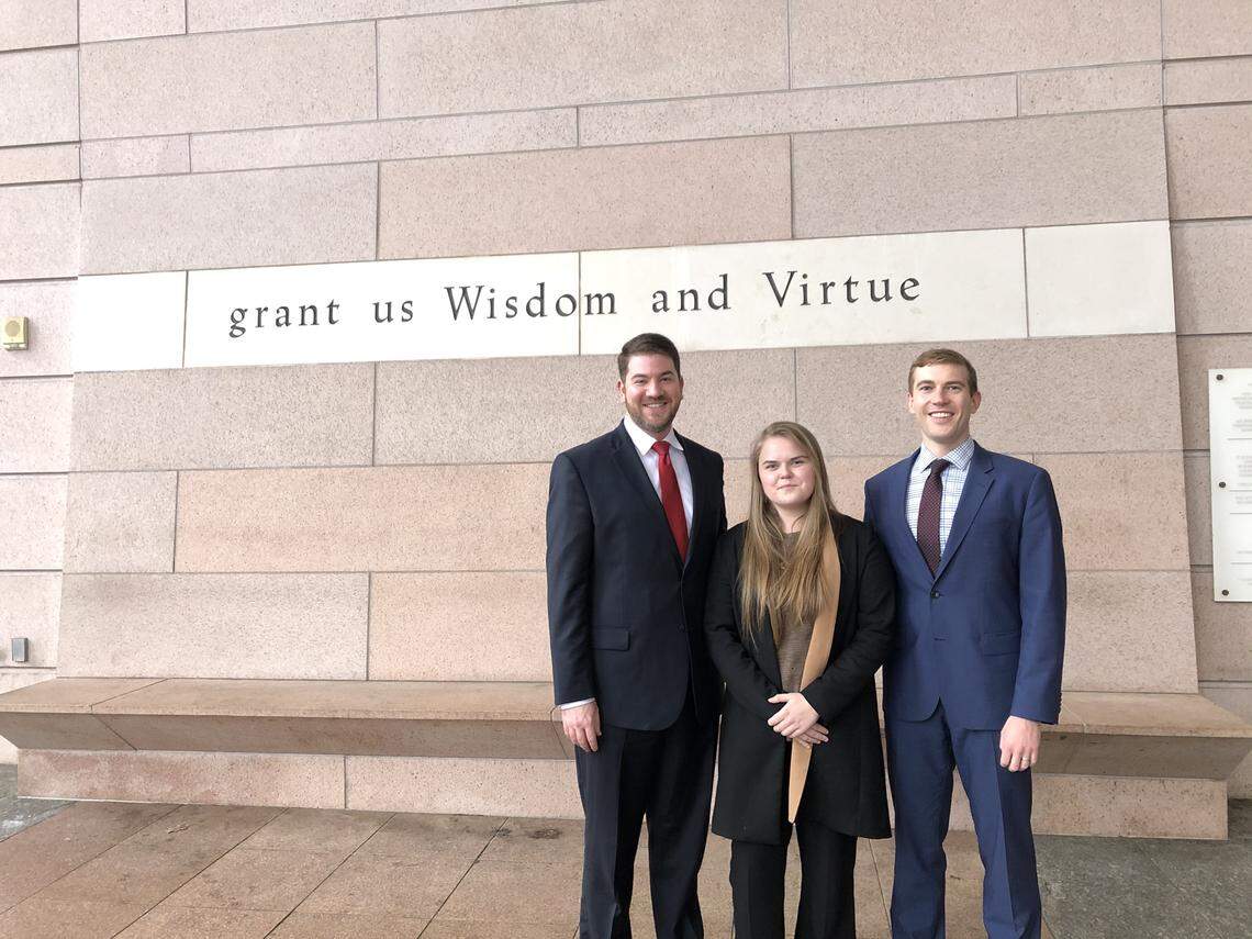 Caroline Cox, shown with attorneys, Kevin Murphy (left) and Sean Hermann, had just turned 18 when she said she was sexually assaulted by her boss at a Cornelius coffee justice. Four years later, she found justice in a Mecklenburg courtroom. 
