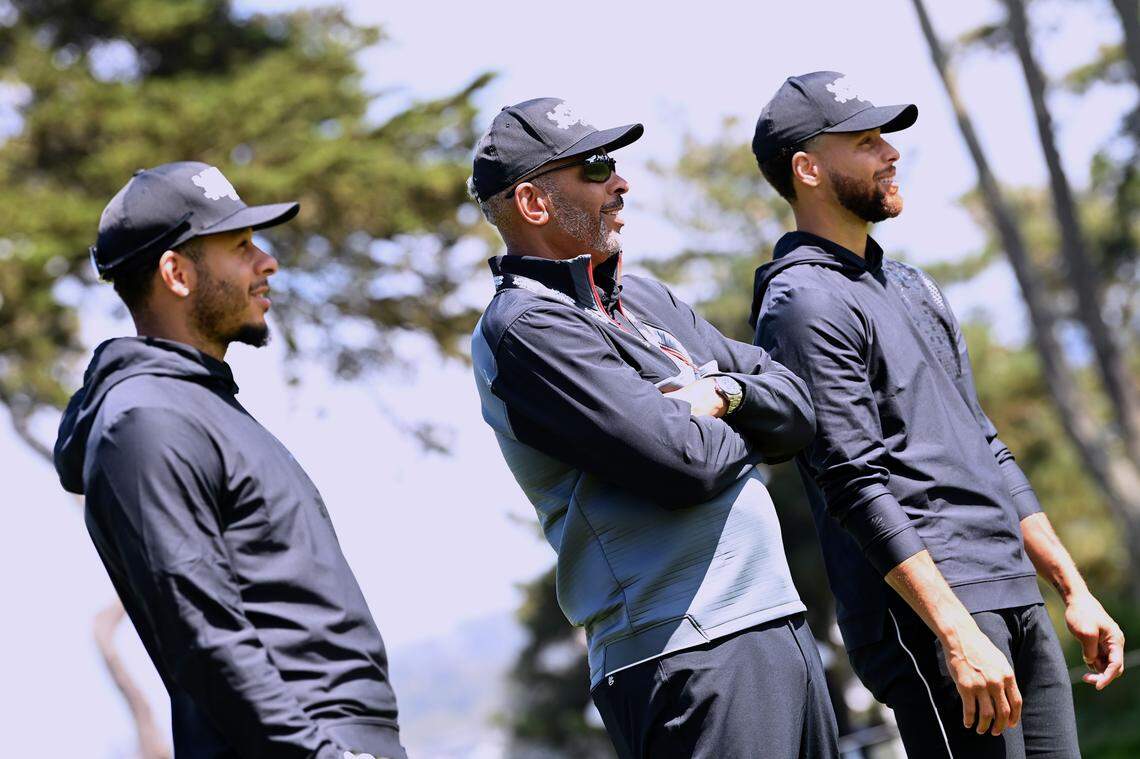 (From left) Seth Curry, Dell Curry and Stephen Curry attend the First Annual Curry Cup presented by Stephen Curry and UNDERRATED Golf on Aug. 30, 2022, at TPC Harding Park in San Francisco.