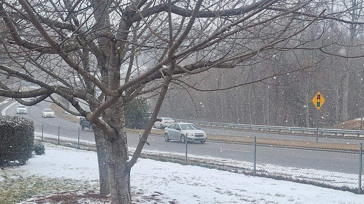 Snow flies into the windshields of drivers on Brawley School Road near Interstate 77 exit 35 in Mooresville at Lake Norman on Thursday, Feb. 5, 2026.