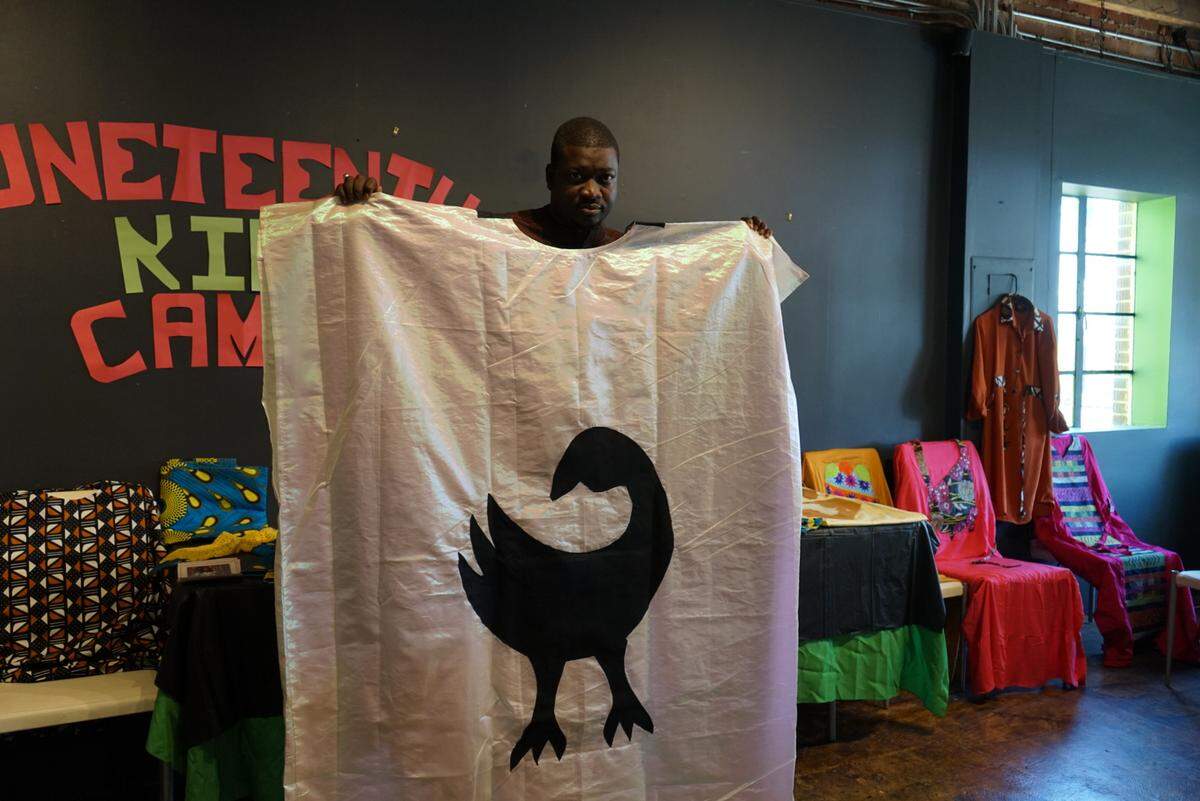 Fashion designer Khadim Soung held Boubou named “Unity and Freedom” for Juneteeth Festival of the Carolina’s clothing ceremony.