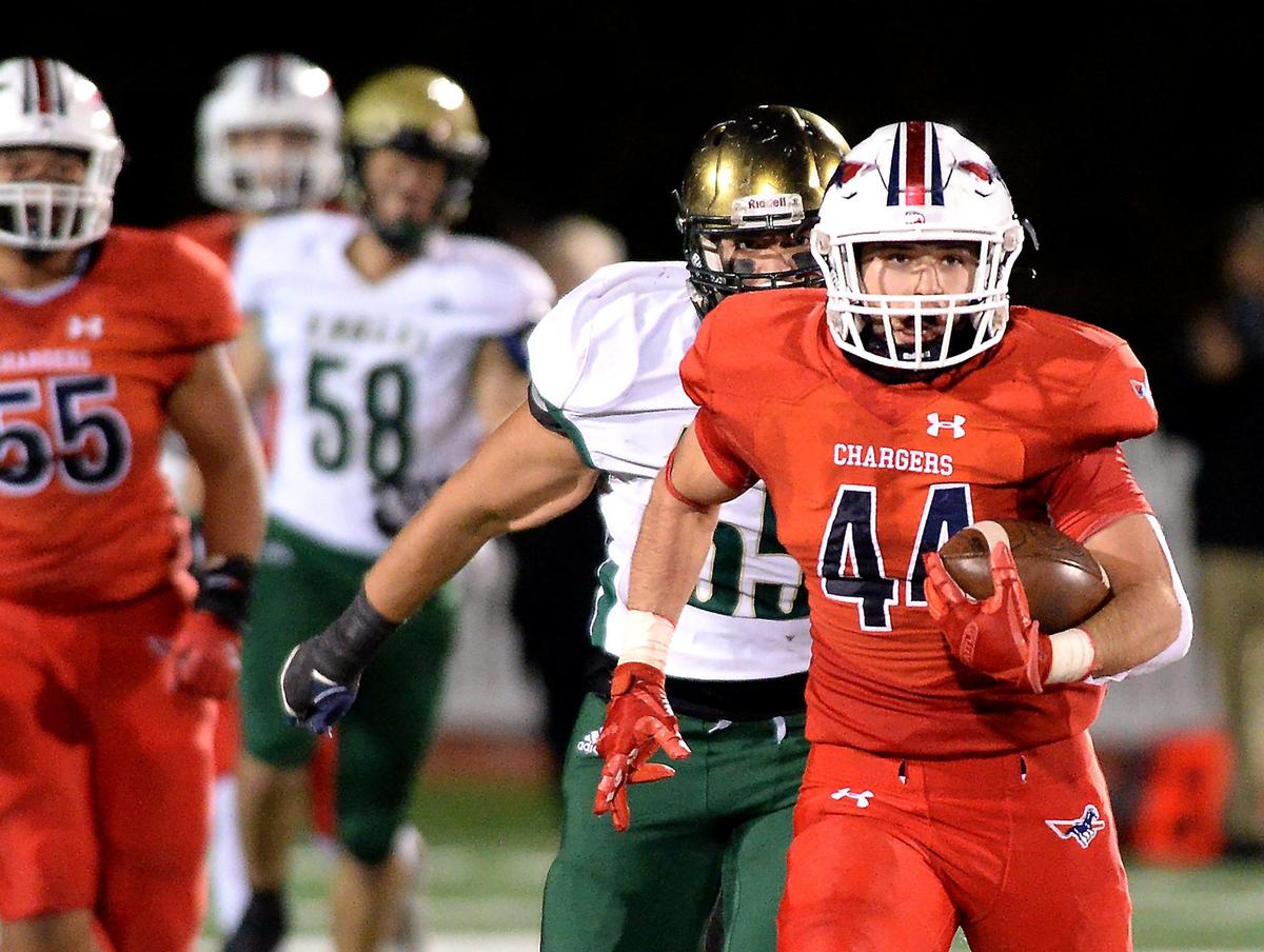 Providence Day Chargers running back Liam Grouix rushes for yardage against Rabun Gap during second quarter action at Providence Day School in Charlotte, NC on Friday, November 19, 2021. The Chargers hosted Rabun Gap in the NCISAA boys state championship game.
