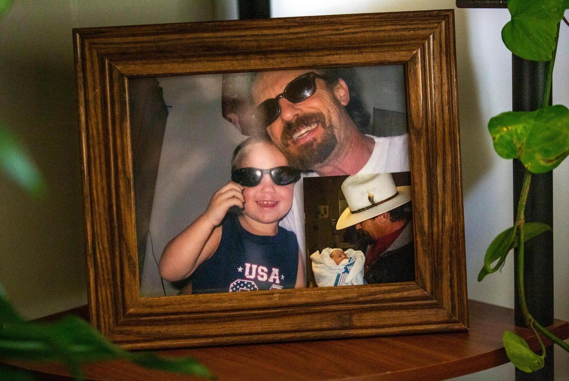 Darrell Kersey appears in many of the family photos decorating shelves in the home of Teresa, Kelli and Kensley Kersey, who lost Darrell to complications of COVID-19 which he tested positive for while incarcerated in the Durham County jail, on Thursday, Oct. 22, 2020, in High Point, N.C.