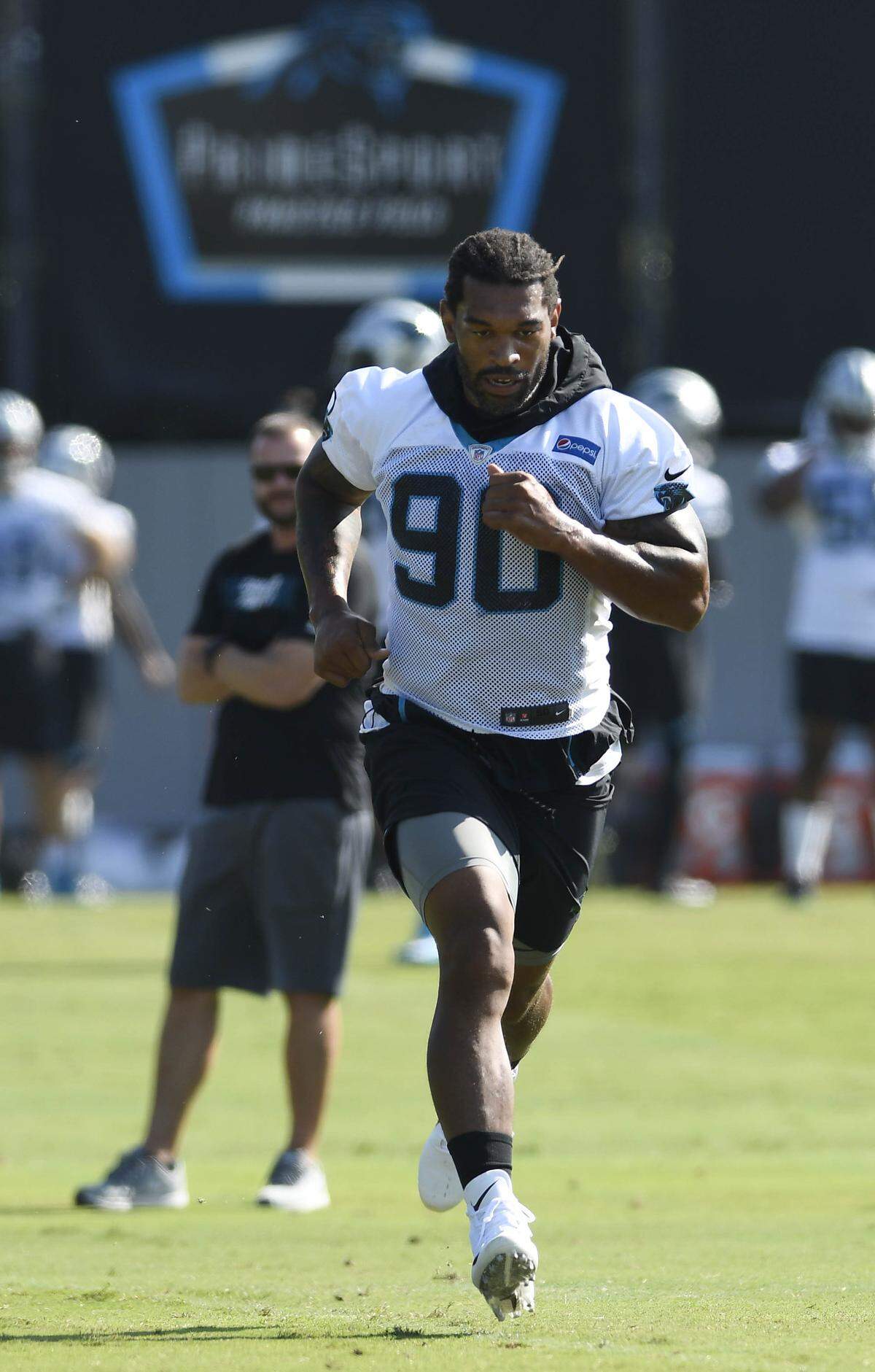 Carolina Panthers defensive end Julius Peppers (90) missed only two games due to injury in 17 NFL seasons.