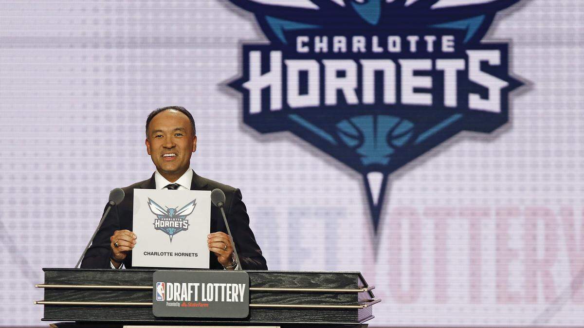 NBA Deputy Commissioner Mark Tatum announces that the Charlotte Hornets had won the 12th pick during the NBA draft lottery Tuesday in Chicago.