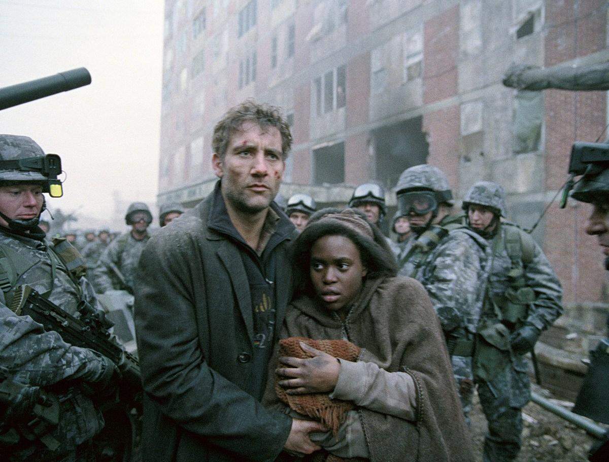 Clive Owen plays a disillusioned bureaucrat protecting Earth’s only pregnant woman (Clare-Hope Ashitey) in “Children of Men.”