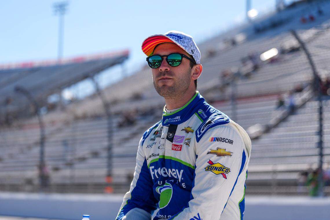 Apr 6, 2024; Martinsville, Virginia, USA; NASCAR Cup Series driver Daniel Suarez (99) looks on during practice at Martinsville Speedway. Mandatory Credit: Jim Dedmon-USA TODAY Sports
