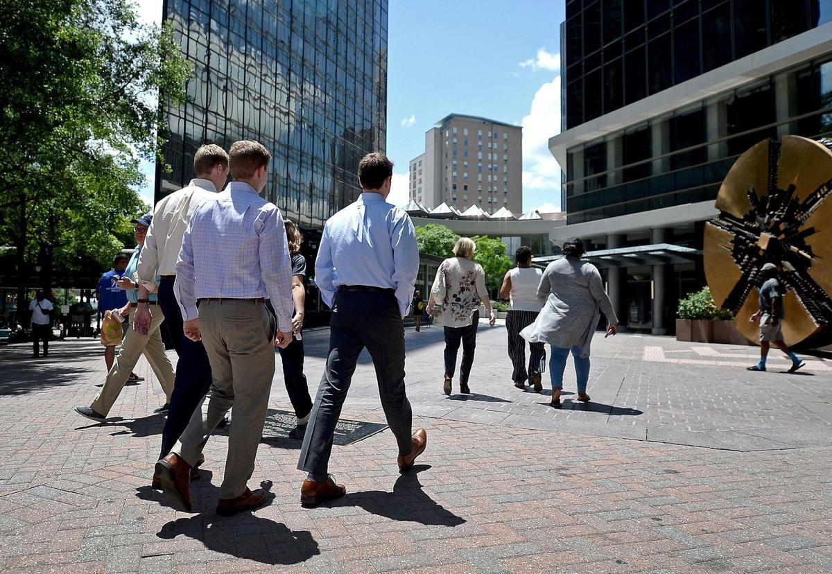 Many Charlotte office workers have been offered the option to return to in-person work. But, according to a recent informal Observer survey, many are still opting to stay home.