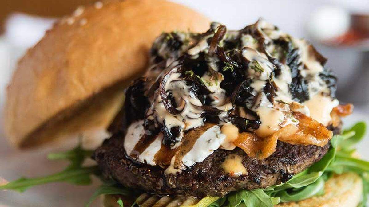 The Nutty Goat Burger at Blacow featured a mix of balsamic onion, garlic and herb goat cheese and pecan mix with a chipotle aioli, candied bacon, pickle and arugula. It won the Moo & Brew Festival in 2018.