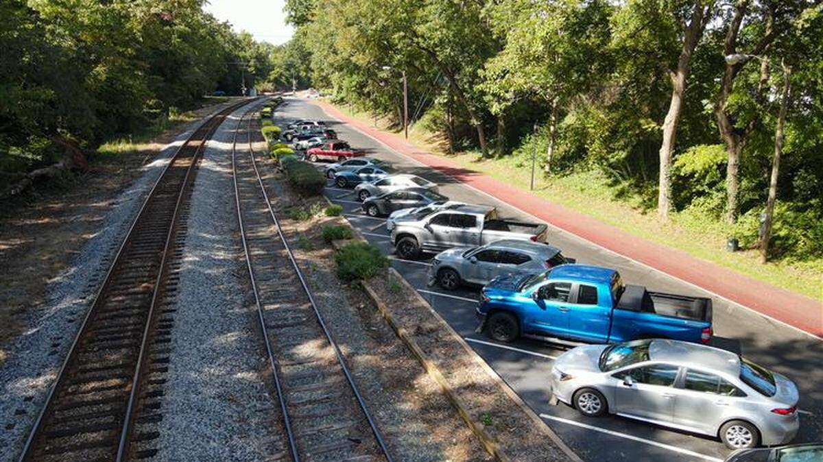The town of Matthews says railroad company CSX wants to charge people to park in nearly a quarter of its downtown parking spaces because town officials turned down a steep increase to lease the spaces.