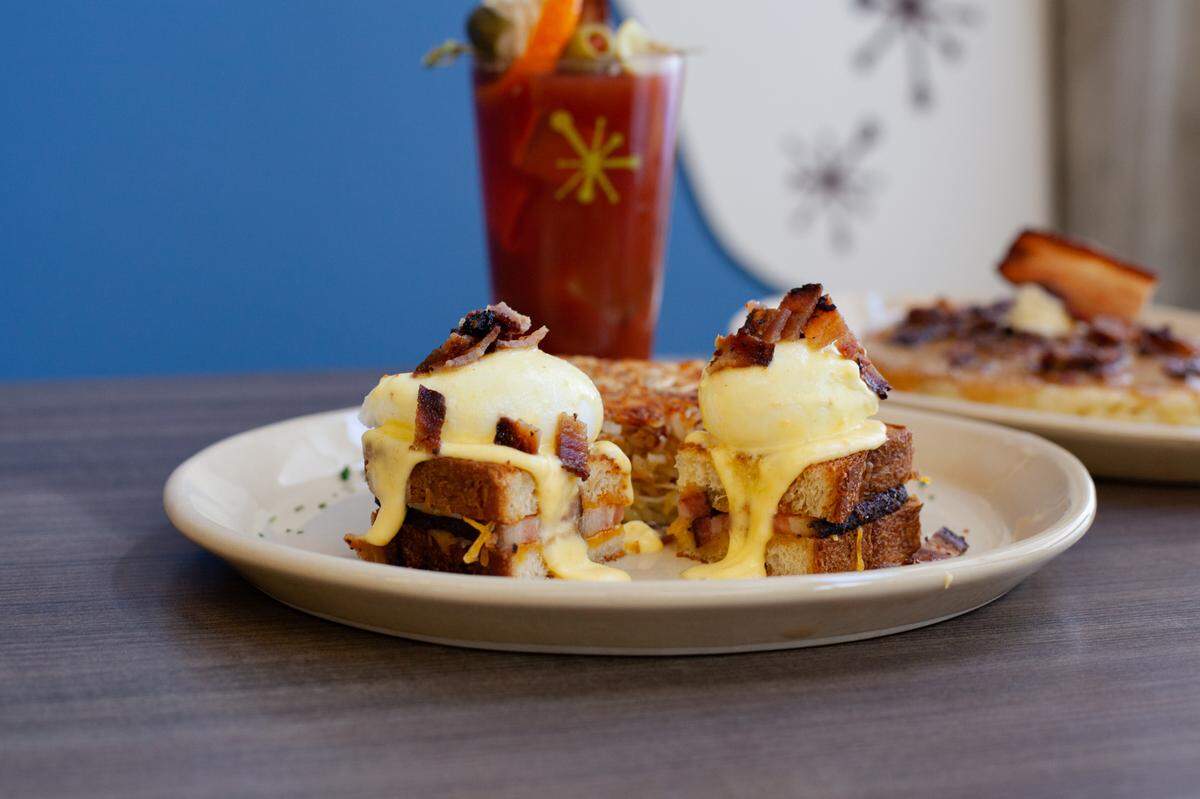 The bacon-infused cocktail pairs perfectly with a Grilled Cheese Benny at Snooze.
