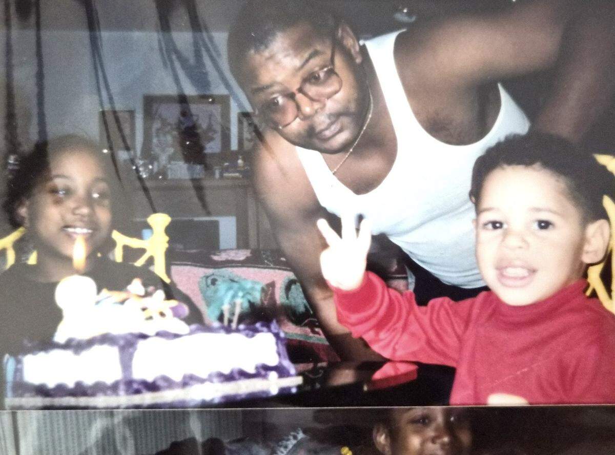 A childhood photo of Matthew Williams-Streat, who recently died while experiencing homelessness. From left, Angette Williams, Gregory Williams and Matthew Williams-Streat