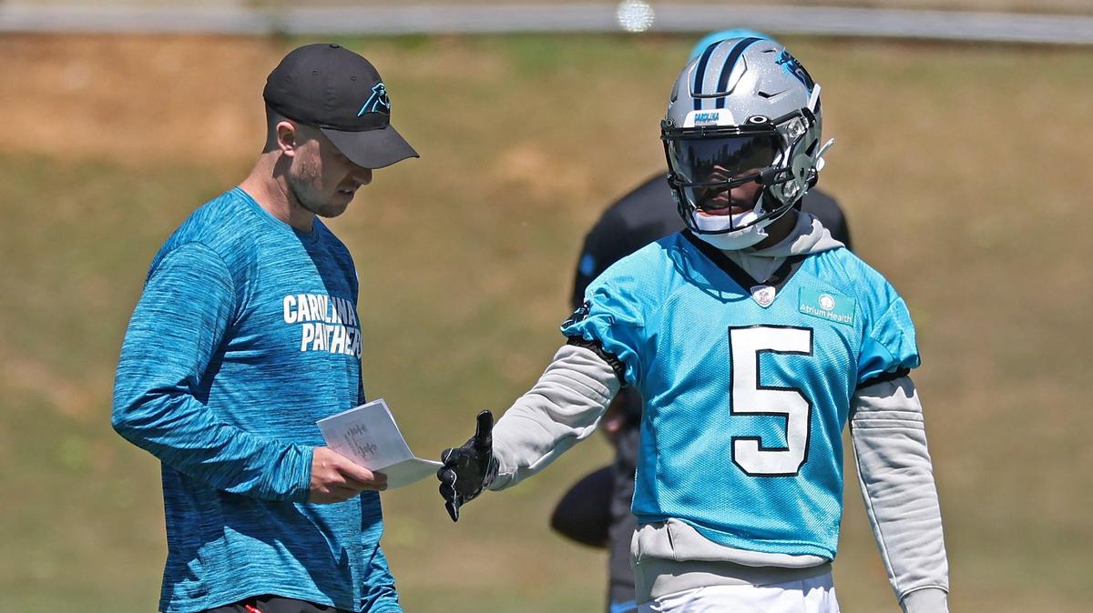 Carolina Panthers wide receiver Diontae Johnson, right, receives instructions during the team’s voluntary minicamp practice on Tuesday, April 23, 2024.