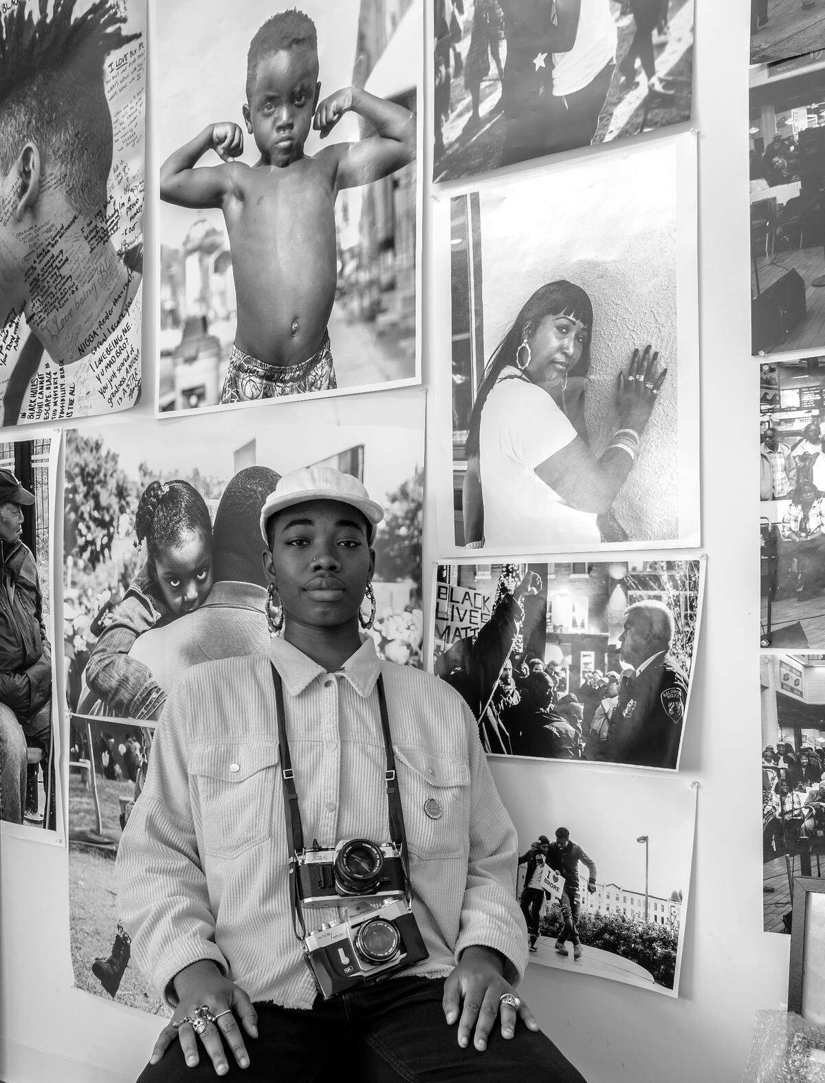 $HAN, a Baltimore-based photographer, is seen with her works. Her solo exhibition, cutXcopy, will be at The New Gallery of Modern Art until June 17.