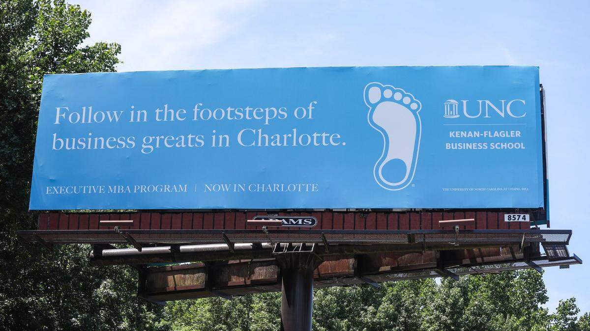 A billboard advertising an extension of UNC Chapel Hill’s MBA program being offered in Charlotte is seen from along I-85 northbound on Wednesday in Charlotte.