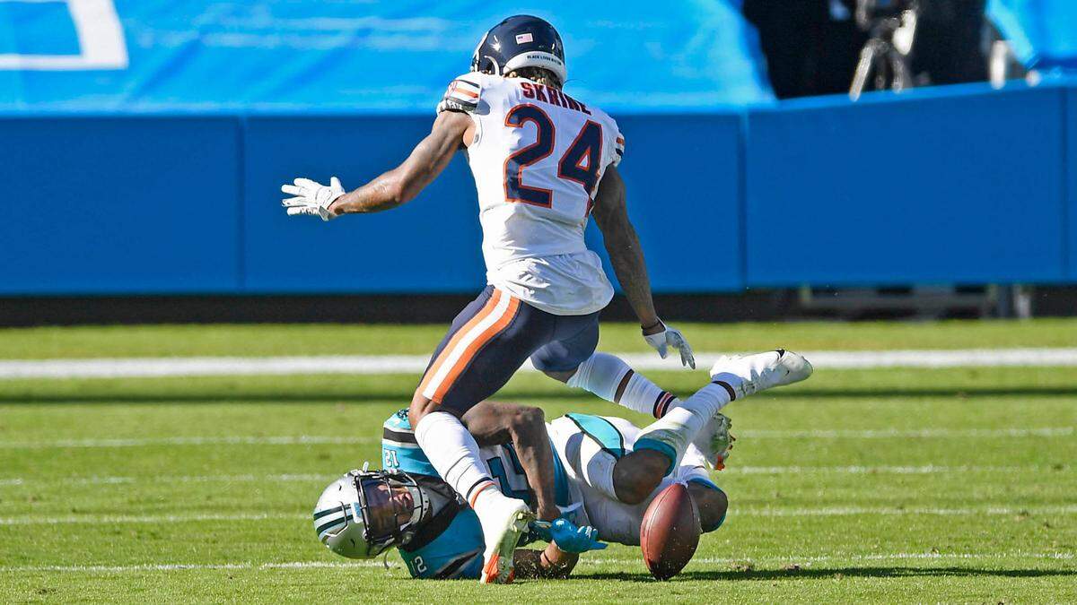 Carolina Panthers wide receiver D.J. Moore (12) said of this fourth-down pass: “I just have to catch the ball at the end of the day.”