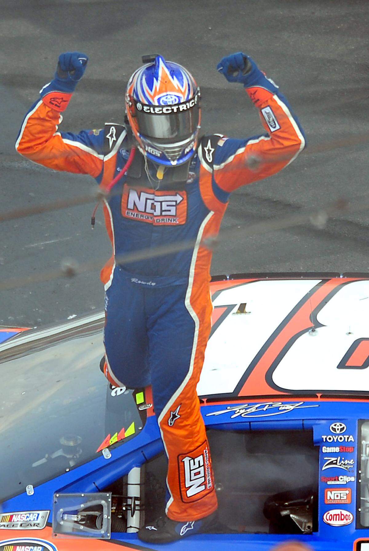5/29/10 NASCAR Nationwide Series driver Kyle Busch celebrates his victory in the Tech-Net Auto Service 300  Saturday at Charlotte Motor Speedway. JEFF SINER - jsiner@charlotteobserver.com