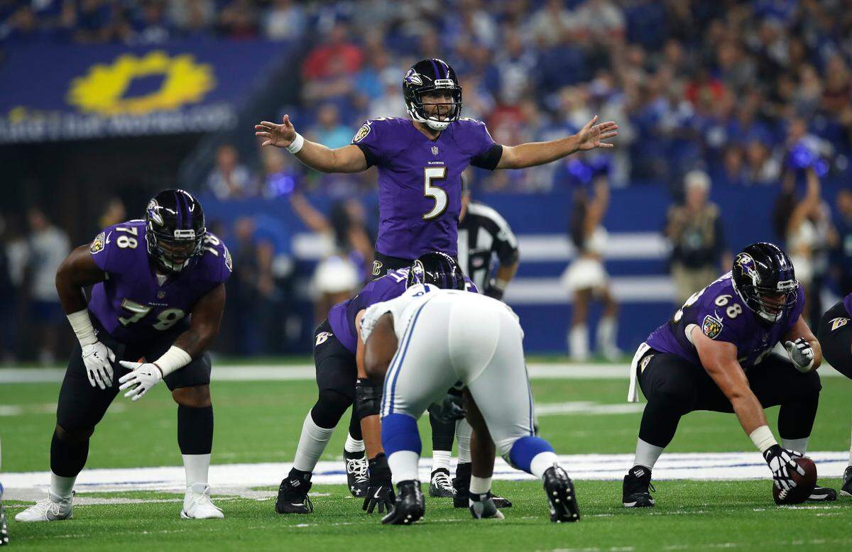 Baltimore Ravens quarterback Joe Flacco (5) hasn't been the most accurate passer in recent years, but a developing Panthers secondary could help remedy that.