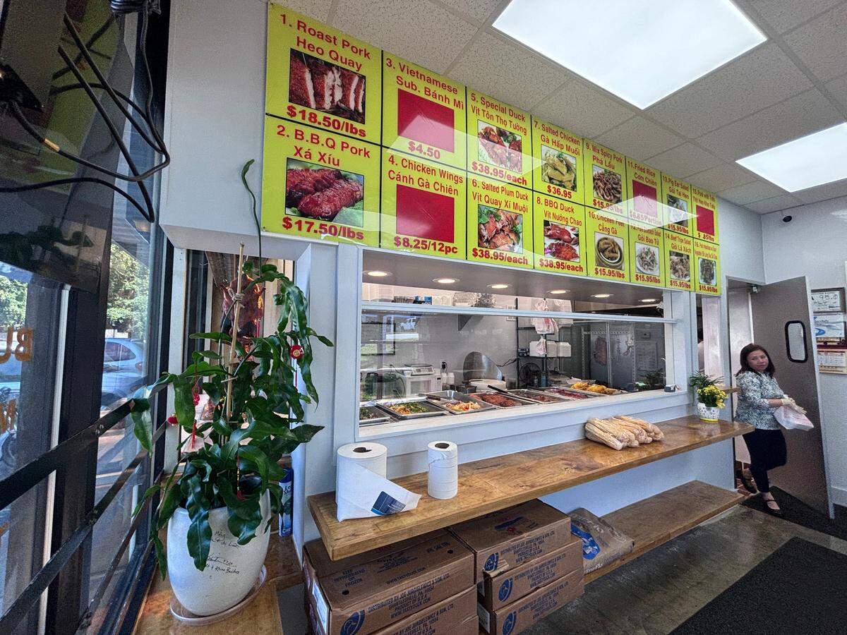 Inside Van Loi, expect traditional Chinese cuisine including roasted duck and pork options.