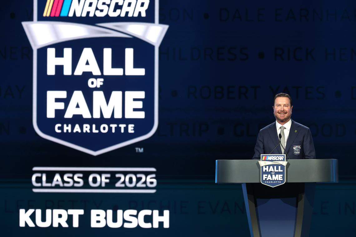 Former NASCAR driver Kurt Busch smiles as he recalls his career during his NASCAR Hall of Fame Induction speech at the Charlotte Convention Center in Charlotte, NC on Friday, January 23, 2026. 