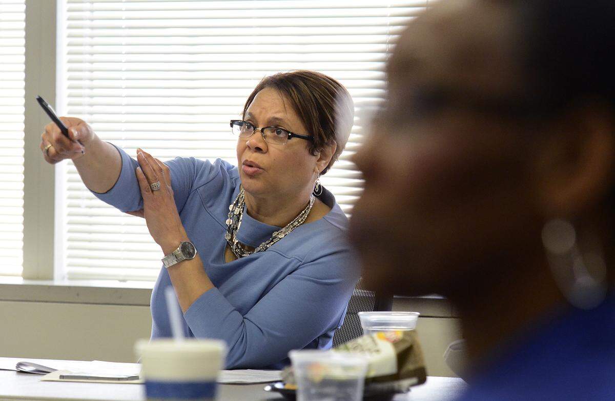 Vi Alexander Lyles asks a question during a transportation committee meeting thursday. Five members of the Charlotte City Council Kenny Smith, Greg Phipps, Vi Alexander Lyles, Patsy Kinsey and David Howard attended a transportation committee meeting Thursday March 27, 2014. Debra Campbell, a member of Ron Carlee's executive team, also attended the meeting.