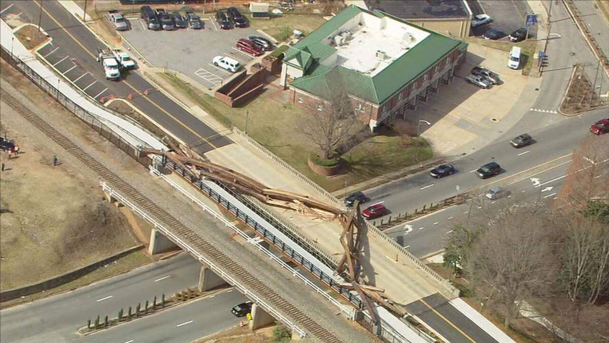 This image from WSOC’s helicopter shows the collapsed wooden arches over Highway 127 in Hickory, NC, on Friday, Feb. 18, 2022.