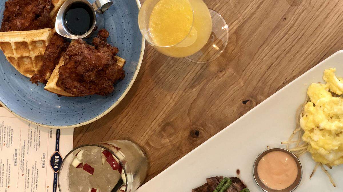 Chicken and waffles is a brunch staple, and at Bulla Gastrobar you can pair it with a mimosa or a fall-inspired Sangria de Otono.