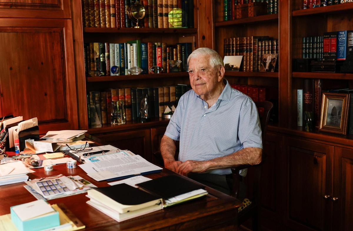 The city that former Bank of America CEO Hugh McColl helped build is honoring his life’s work and impact by renaming Thomas Polk Park in uptown Charlotte in his honor on June 21. Shown, McColl at his home on June 6, 2025.
