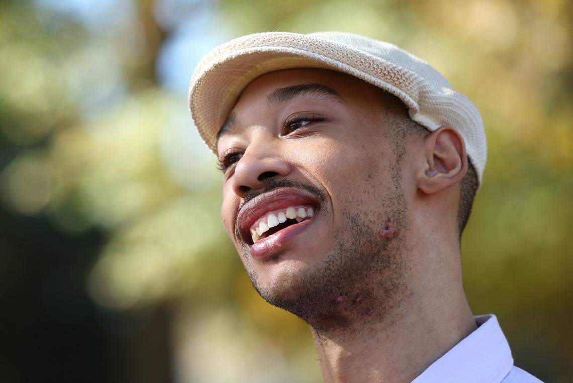 Chancellor Lee Adams smiles as he and his grandmother, Saundra Adams are interviewed on Wednesday, October 30, 2024 at Freedom Park in Charlotte, NC.