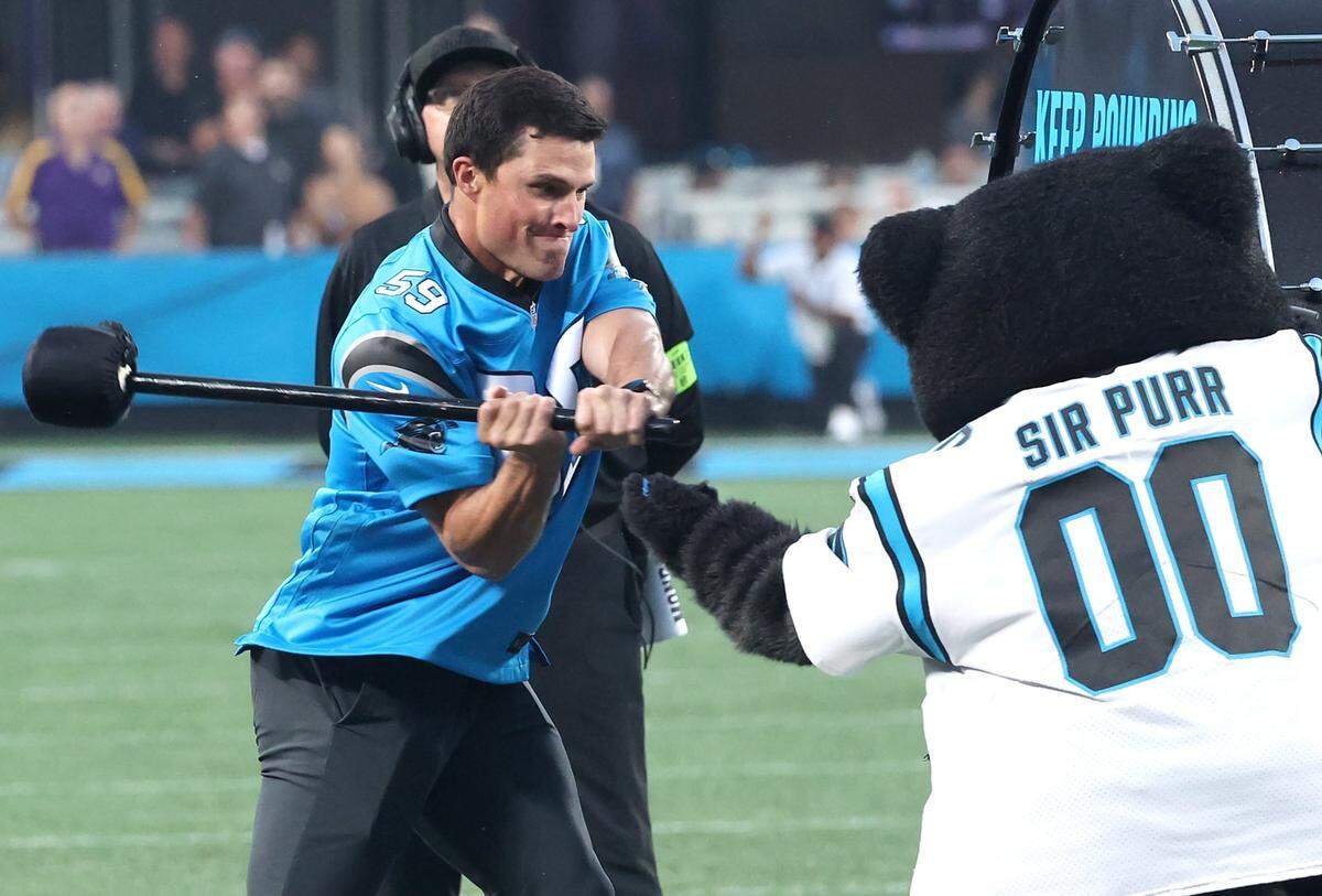 Former Carolina Panthers linebacker Luke Kuechly hits the Keep Pounding drum at Bank of America Stadium prior to the team’s game against the New Orleans Saints on Monday, September 18, 2023.
