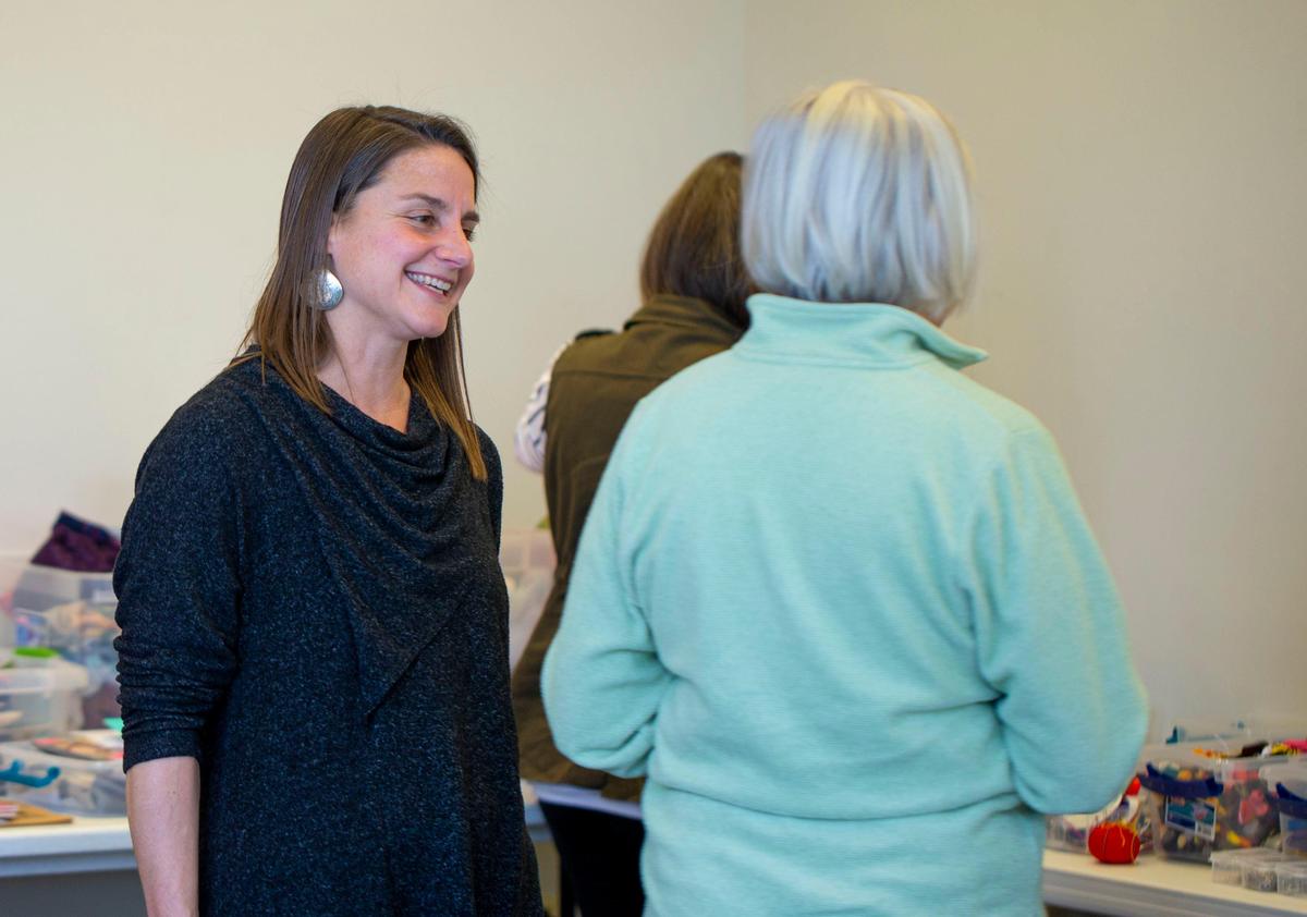 Charlotte artist Andrea Downs talks with a participant at a February “Laundry Day” event at the Levine Museum of the New South. The workshops are part of Downs’ ”Airing Out the ‘Dirty’ Laundry” project. Women of all backgrounds and gender expressions are invited to tell their stories through visual art.